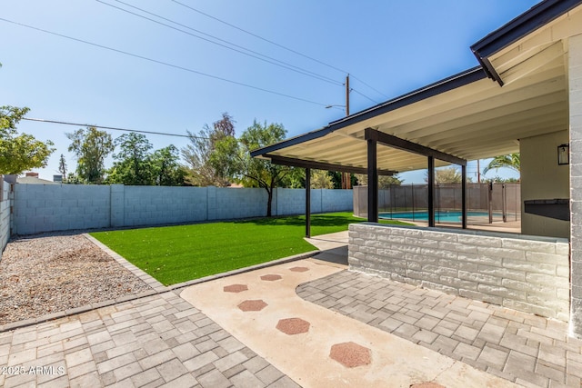 8602 N 42nd Dr, Phoenix, AZ 85051 - fenced backyard with a patio area