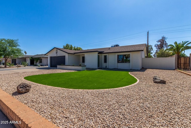 8602 N 42nd Dr, Phoenix, AZ 85051 - view of front of property with concrete driveway, stucco siding, a garage, and a shingled roof