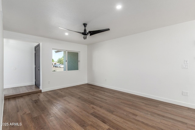 8602 N 42nd Dr, Phoenix, AZ 85051 - spare room with ceiling fan, wood finished floors, and recessed lighting