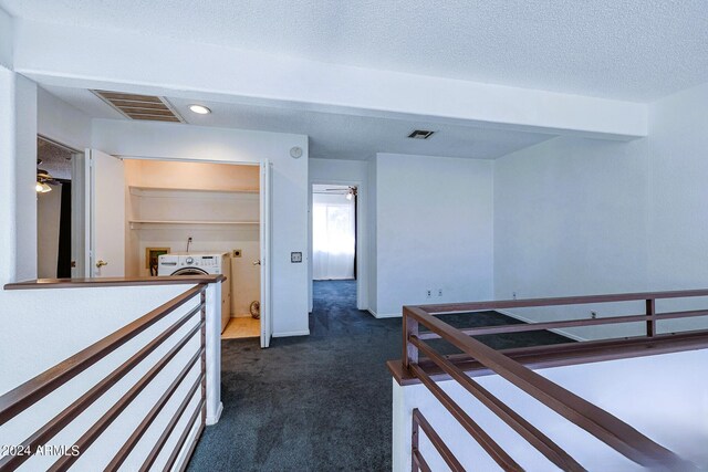 carpeted bedroom with a textured ceiling