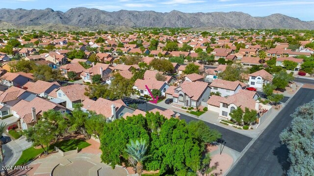 drone / aerial view featuring a mountain view