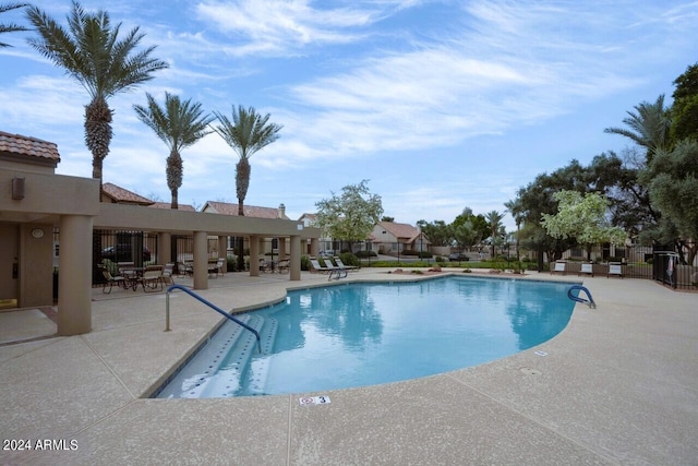 view of pool with a patio