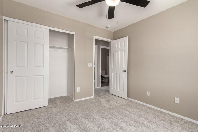 906 S 242nd Dr, Buckeye, AZ 85326 - unfurnished bedroom featuring carpet, a closet, baseboards, and ceiling fan