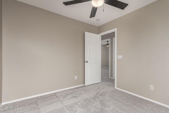 906 S 242nd Dr, Buckeye, AZ 85326 - carpeted empty room with a ceiling fan and baseboards