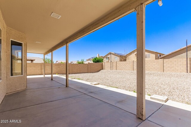906 S 242nd Dr, Buckeye, AZ 85326 - fenced backyard with a patio