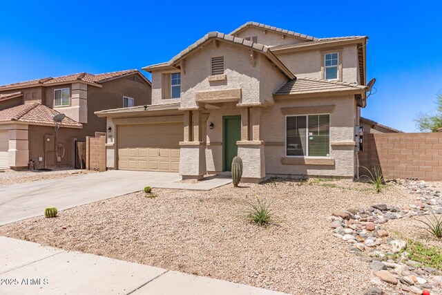 906 S 242nd Dr, Buckeye, AZ 85326 - view of front facade with driveway, stucco siding, a garage, and a tiled roof