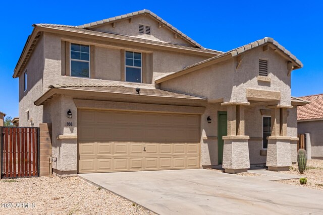 906 S 242nd Dr, Buckeye, AZ 85326 - view of front of property with a tiled roof, driveway, stucco siding, and a garage