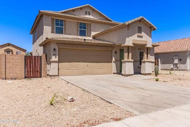 906 S 242nd Dr, Buckeye, AZ 85326 - view of front facade featuring stucco siding, concrete driveway, a gate, and a tile roof