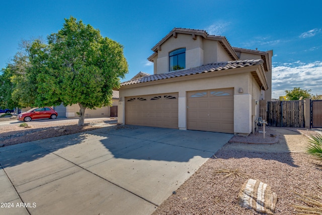 view of front of property with a garage