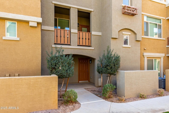 view of building exterior featuring central AC unit