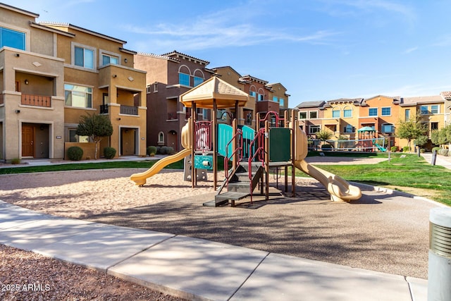 community playground featuring a residential view