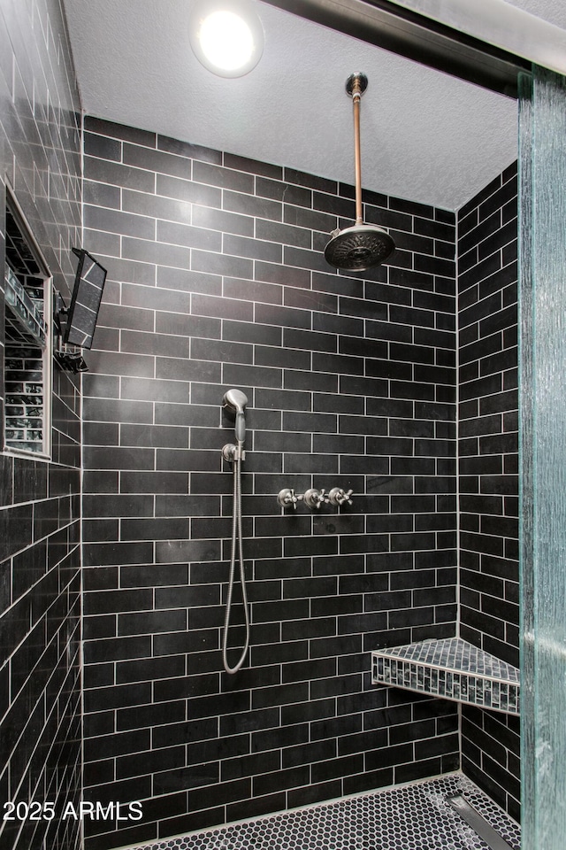 bathroom with a stall shower