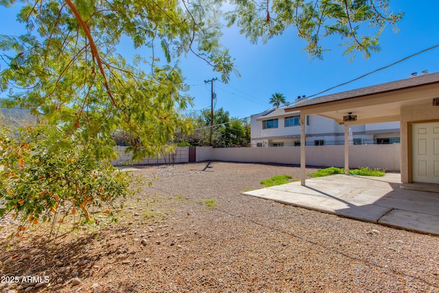 view of yard with a patio area and a fenced backyard