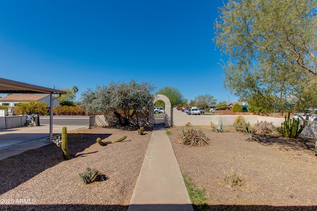 view of yard with fence