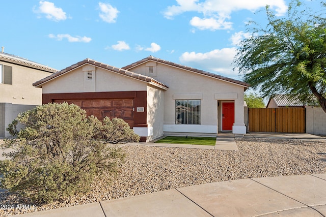 view of front of property featuring a garage