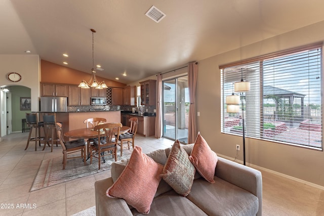 1398 W Sheep Wash Way, Benson, AZ 85602 - living area with vaulted ceiling, a chandelier, plenty of natural light, light tile patterned flooring, and recessed lighting