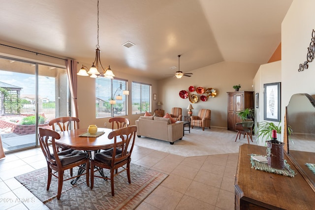 1398 W Sheep Wash Way, Benson, AZ 85602 - dining space with light tile patterned flooring, lofted ceiling, ceiling fan, a chandelier, and light colored carpet
