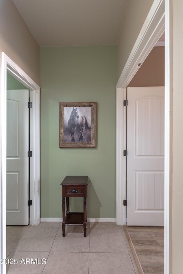 1398 W Sheep Wash Way, Benson, AZ 85602 - hallway with light tile patterned floors and baseboards