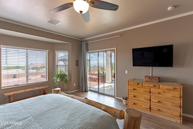 1398 W Sheep Wash Way, Benson, AZ 85602 - bedroom with access to exterior, wood finished floors, baseboards, ornamental molding, and a ceiling fan