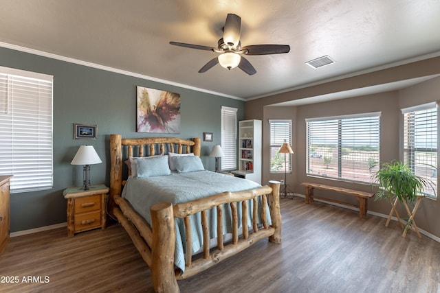 1398 W Sheep Wash Way, Benson, AZ 85602 - bedroom with baseboards, wood finished floors, multiple windows, and crown molding