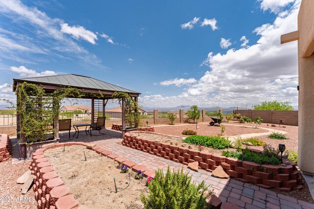 1398 W Sheep Wash Way, Benson, AZ 85602 - view of patio / terrace with a gazebo and a fenced backyard