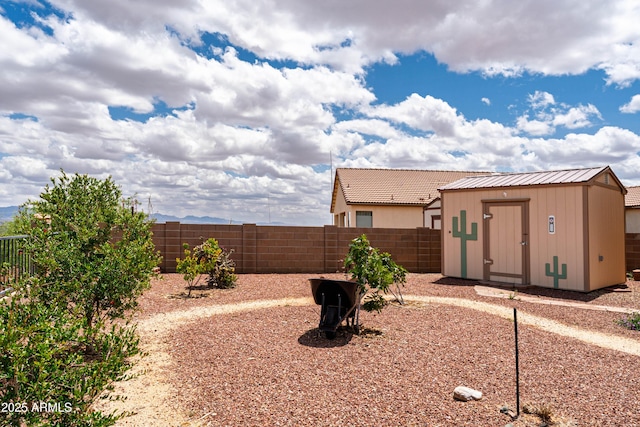 1398 W Sheep Wash Way, Benson, AZ 85602 - fenced backyard with a storage shed and an outdoor structure
