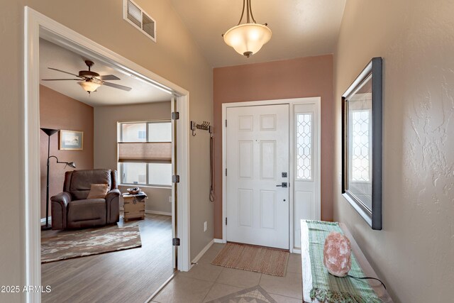 1398 W Sheep Wash Way, Benson, AZ 85602 - foyer featuring a ceiling fan and baseboards