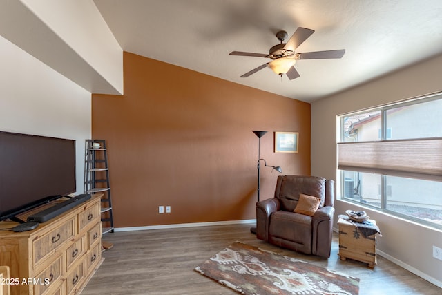 1398 W Sheep Wash Way, Benson, AZ 85602 - sitting room featuring a ceiling fan, wood finished floors, and baseboards