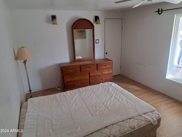 bedroom featuring ceiling fan and light wood-type flooring