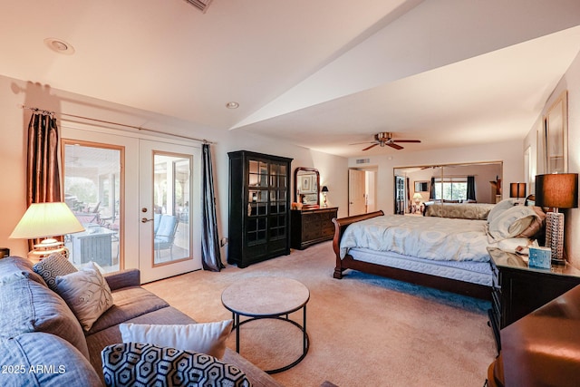 carpeted bedroom featuring ceiling fan, lofted ceiling, french doors, and access to outside