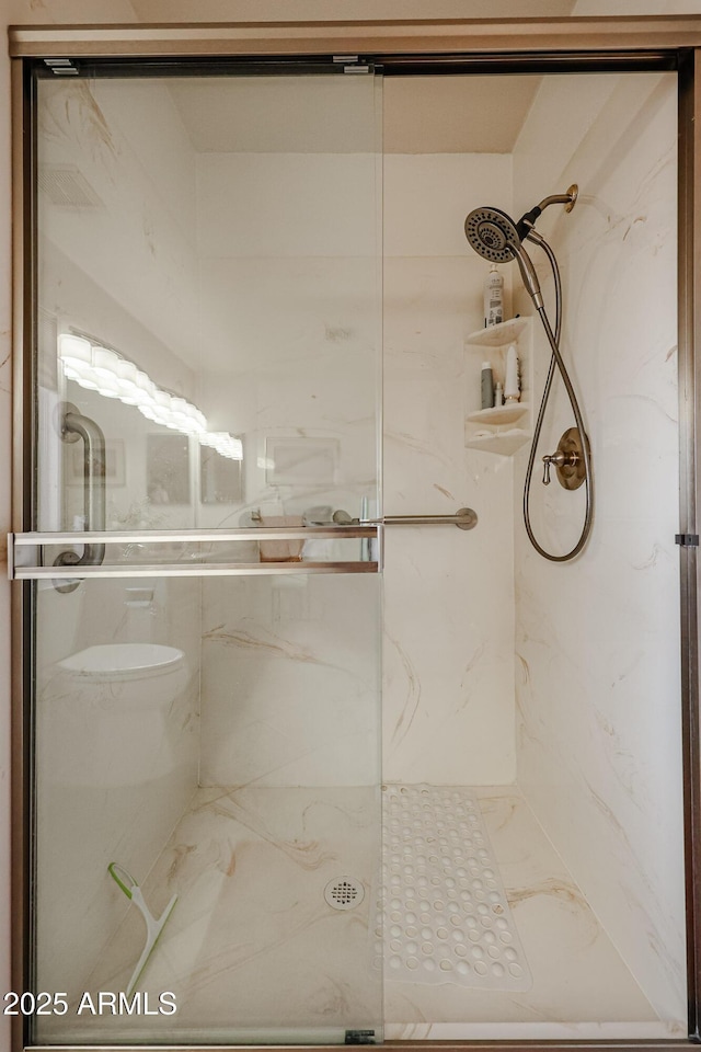 bathroom with an enclosed shower