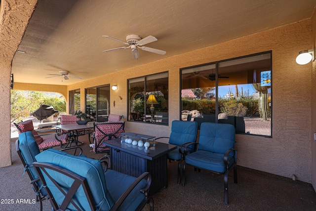 view of patio featuring ceiling fan and outdoor lounge area