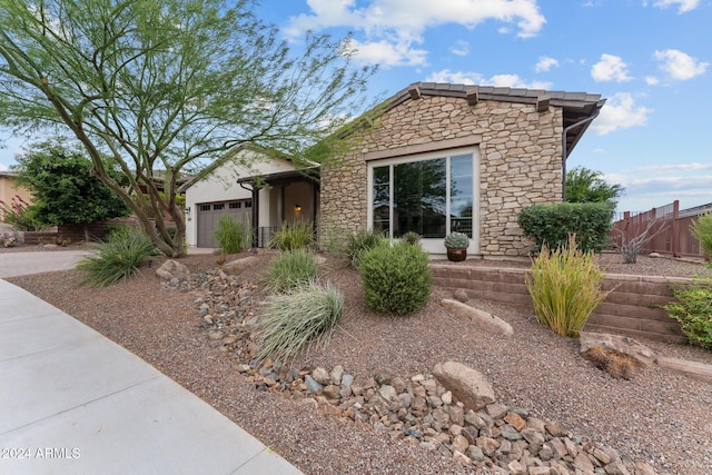 view of front of home with a garage