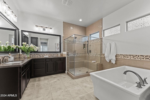 bathroom with vanity, plus walk in shower, and tile patterned floors