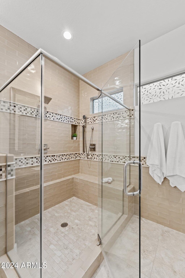 bathroom featuring walk in shower