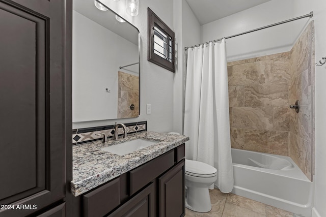 full bathroom with vanity, toilet, and shower / bath combo with shower curtain