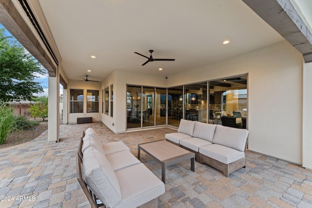 view of patio featuring an outdoor hangout area and ceiling fan