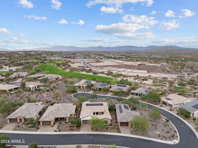 birds eye view of property featuring a mountain view