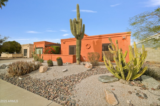 view of adobe home