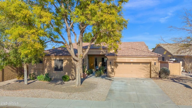 view of front of property featuring a garage