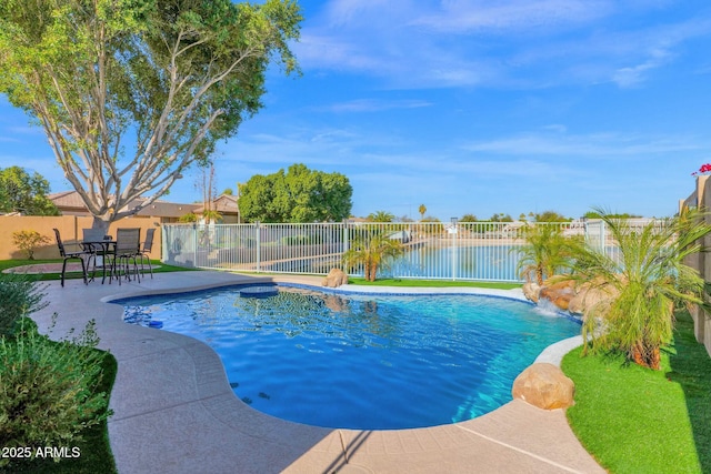 view of pool featuring pool water feature and a patio