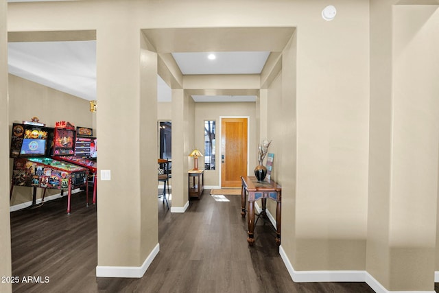 hall with dark hardwood / wood-style floors