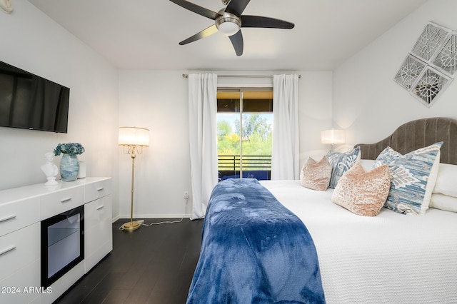 bedroom featuring access to outside, ceiling fan, and dark wood-type flooring