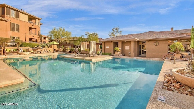 view of swimming pool with a patio area