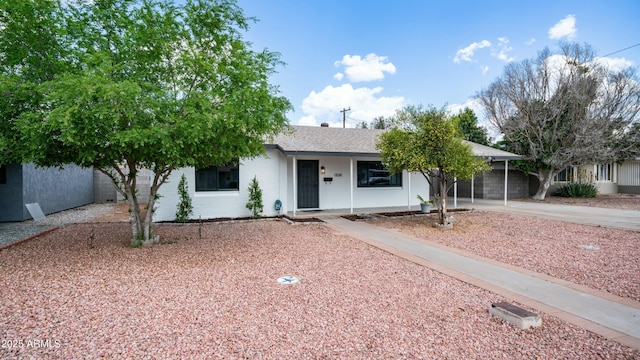 1838 E Earll Dr, Phoenix, AZ 85016 - single story home featuring stucco siding and driveway