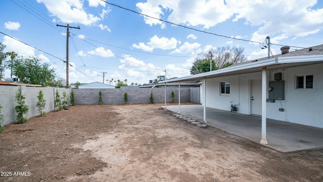 1838 E Earll Dr, Phoenix, AZ 85016 - view of yard with a fenced backyard, an attached carport, and a patio