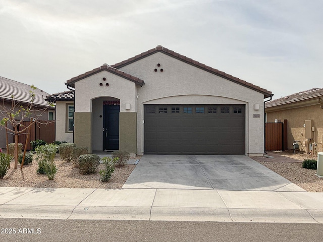 mediterranean / spanish-style house featuring a garage