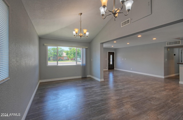 unfurnished room with a textured ceiling, dark hardwood / wood-style flooring, high vaulted ceiling, and a chandelier