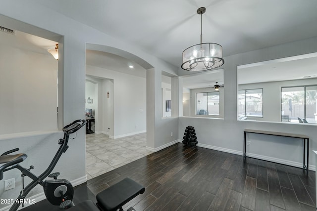 workout area featuring wood-type flooring