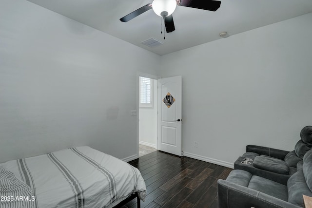 bedroom featuring ceiling fan and dark hardwood / wood-style flooring